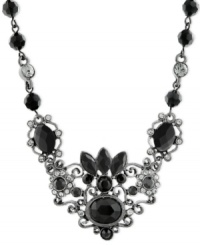 When a look of intrigue is needed. This necklace from 2028 captivates with jet black and black diamond crystals on an intricate silhouette. Crafted in hematite-tone mixed metal. Approximate length: 16 inches + 3-inch extender. Approximate drop: 1-1/4 inches. When a look of intrigue is needed. This necklace from 2028 captivates with jet black and black diamond crystals on an intricate silhouette. Crafted in hematite-tone mixed metal. Approximate length: 16 inches + 3-inch extender. Approximate drop: 1-1/4 inches.
