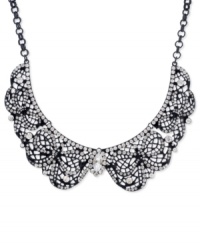 Get haute under this collar necklace from Betsey Johnson. Crafted from black-plated mixed metal, the necklace features an elegant filigree design and glass crystal accents for added luster. Approximate length: 17 inches + 3-inch extender. Approximate drop: 1-3/8 inches. Get haute under this collar necklace from Betsey Johnson. Crafted from black-plated mixed metal, the necklace features an elegant filigree design and glass crystal accents for added luster. Approximate length: 17 inches + 3-inch extender. Approximate drop: 1-3/8 inches.