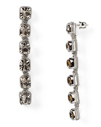 Walk a glamorous line with ABS by Allen Schwartz's linear rhinestone earrings. The grey baubles compliment LBDs and bright dresses with cool shimmer. Walk a glamorous line with ABS by Allen Schwartz's linear rhinestone earrings. The grey baubles compliment LBDs and bright dresses with cool shimmer.