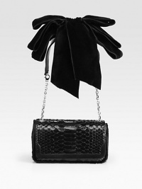 A sleek evening bag that exudes timeless elegance, crafted from rich python and haircalf with a lush velvet bow at the shoulder.Shoulder strap, 10½ drop Magnetic snap flap closure One inside open pocket Faille lining 8W X 4½H X 2D Made in Italy A sleek evening bag that exudes timeless elegance, crafted from rich python and haircalf with a lush velvet bow at the shoulder.Shoulder strap, 10½ drop Magnetic snap flap closure One inside open pocket Faille lining 8W X 4½H X 2D Made in Italy