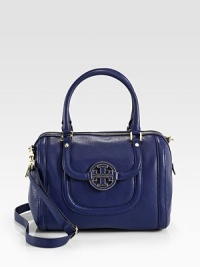 A luxurious pebbled leather style accented with a self-covered logo emblem and radiant hardware.Double top handles, 6 dropDetachable adjustable shoulder strap, 11½-23 dropTop zip closureOne outside flap pocketOne outside open pocketOne inside zip pocketCotton lining11W X 8H X 7DImported Please note: Hardware colors may vary A luxurious pebbled leather style accented with a self-covered logo emblem and radiant hardware.Double top handles, 6 dropDetachable adjustable shoulder strap, 11½-23 dropTop zip closureOne outside flap pocketOne outside open pocketOne inside zip pocketCotton lining11W X 8H X 7DImported Please note: Hardware colors may vary
