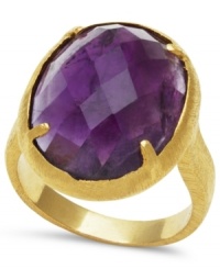 Adorn yourself with the season's hottest hues: jewel tones! This eye-catching ring features a faceted round-cut amethyst (8-7/8 ct. t.w.) set in 18k gold over sterling silver. Size 7.