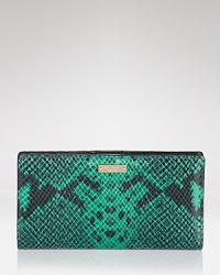 This kate spade new york wallet flaunts a perfect mix of style and substance, crafted of snake embossed leather. It's a wildly exotic essential. This kate spade new york wallet flaunts a perfect mix of style and substance, crafted of snake embossed leather. It's a wildly exotic essential.