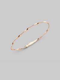 Simply stunning, this 18k rose gold bangle with delicate ridges and twists is great on its own, even better when stacked in multiples. 18k rose goldDiameter, about 2½Tongue-and-groove claspImported Simply stunning, this 18k rose gold bangle with delicate ridges and twists is great on its own, even better when stacked in multiples. 18k rose goldDiameter, about 2½Tongue-and-groove claspImported