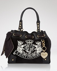 With a big pink bow, romantic charms and soft velour, this Juicy Couture bag is girlish and sweet. With a big pink bow, romantic charms and soft velour, this Juicy Couture bag is girlish and sweet.