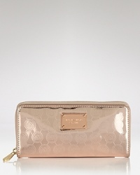 Compact style goes glossy with this leather wallet from MICHAEL Michael Kors. Niches for the essentials ensure organization, while a satiates label lust. Compact style goes glossy with this leather wallet from MICHAEL Michael Kors. Niches for the essentials ensure organization, while a satiates label lust.