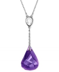 Amazing amethyst. Purple reigns in this pendant from Swarovski. Crafted from rhodium-plated mixed metal and featuring a stunning amethyst offset with crystal accents, this necklace is a thing of beauty. Approximate length: 16 inches. Approximate drop: 1 inch. Amazing amethyst. Purple reigns in this pendant from Swarovski. Crafted from rhodium-plated mixed metal and featuring a stunning amethyst offset with crystal accents, this necklace is a thing of beauty. Approximate length: 16 inches. Approximate drop: 1 inch.