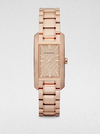 A warm timepiece with a iconic, check stamped dial and a slim silhouette. Quartz movementWater resistant to 5 ATMRectangular rose goldtone stainless steel case, 20mm (.78)Smooth bezelNude check stamped dialBar hour markersRose goldtone stainless steel braceletMade in Switzerland A warm timepiece with a iconic, check stamped dial and a slim silhouette. Quartz movementWater resistant to 5 ATMRectangular rose goldtone stainless steel case, 20mm (.78)Smooth bezelNude check stamped dialBar hour markersRose goldtone stainless steel braceletMade in Switzerland