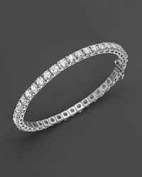 Diamond tennis bracelet in a four-prong white gold setting. Diamond tennis bracelet in a four-prong white gold setting.