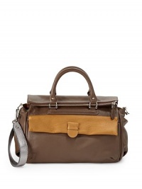 THE LOOKTubular leather double top handlesRemovable flat leather crossbody strapSquare silhouettePebble leather constructionTop zip closureFront pocket with contrast leather flapBack zip pocket and logo detailOne inside zip pocketTwo inside open pocketsInside key clipInside logo detailTHE MEASUREMENTDouble top handles, 6 dropCrossbody strap THE LOOKTubular leather double top handlesRemovable flat leather crossbody strapSquare silhouettePebble leather constructionTop zip closureFront pocket with contrast leather flapBack zip pocket and logo detailOne inside zip pocketTwo inside open pocketsInside key clipInside logo detailTHE MEASUREMENTDouble top handles, 6 dropCrossbody strap