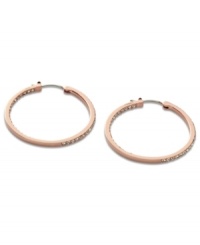 Non-stop glitz from Fossil. These classic hoop earrings embrace modern trends with rosy hues and pave crystal accents. Crafted in rose-gold tone mixed metal. Approximate diameter: 1-3/8 inches. Non-stop glitz from Fossil. These classic hoop earrings embrace modern trends with rosy hues and pave crystal accents. Crafted in rose-gold tone mixed metal. Approximate diameter: 1-3/8 inches.