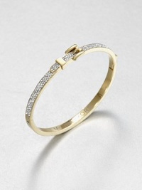 From the Buckle Collection. Encrusted with rhinestones on half, smooth and polished on the other, this graceful bangle is topped with a gleaming golden buckle accent.GlassGoldtoneDiameter, about 2.5Hinged with push-lock claspImported From the Buckle Collection. Encrusted with rhinestones on half, smooth and polished on the other, this graceful bangle is topped with a gleaming golden buckle accent.GlassGoldtoneDiameter, about 2.5Hinged with push-lock claspImported