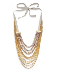 THE LOOKGold-tone chains with partially covered Mamba print crinkle chiffonRibbon tie closureTHE FITAbout 16 long25MM grosgrain tieTHE MATERIALChain: BrassTrim: SilkClosure: Viscose rayon ORIGINImported THE LOOKGold-tone chains with partially covered Mamba print crinkle chiffonRibbon tie closureTHE FITAbout 16 long25MM grosgrain tieTHE MATERIALChain: BrassTrim: SilkClosure: Viscose rayon ORIGINImported