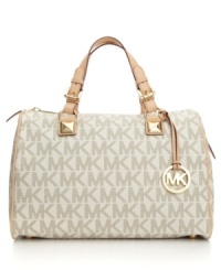 MICHAEL Michael Kors styles the classic purse in super-soft leather and adds bold hardware for a chic, modern finish. MICHAEL Michael Kors styles the classic purse in super-soft leather and adds bold hardware for a chic, modern finish.