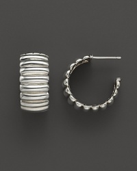 Wide, gleaming sterling silver hoop earrings from the John Hardy Bedeg collection. Wide, gleaming sterling silver hoop earrings from the John Hardy Bedeg collection.