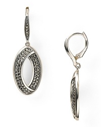 Judith Jack shapes up with this pair of sterling silver drop earrings. Dipped in marcasite stones, this style flaunts an eye-catching design with sophisticated sparkle. Judith Jack shapes up with this pair of sterling silver drop earrings. Dipped in marcasite stones, this style flaunts an eye-catching design with sophisticated sparkle.