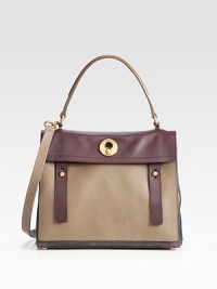 Pebbled calfskin leather in a structured frame with a detachable shoulder strap.Top handle, 6 dropDetachable shoulder strap, 19¾ dropFlap clasp closureOne outside open pocketThree inner compartmentsOne inside zip pocketCotton?? lining12¾W X 9¾H X 5¾DMade in Italy Pebbled calfskin leather in a structured frame with a detachable shoulder strap.Top handle, 6 dropDetachable shoulder strap, 19¾ dropFlap clasp closureOne outside open pocketThree inner compartmentsOne inside zip pocketCotton?? lining12¾W X 9¾H X 5¾DMade in Italy