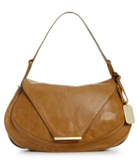 Shoulder this simple yet chic silhouette from Vince Camuto and instantly upgrade your everyday ensemble. Luxuriously soft leather, gleaming golden hardware and refined detail stitching provide unquestionable allure, while the inside is all about keeping your essentials organized and in place. Shoulder this simple yet chic silhouette from Vince Camuto and instantly upgrade your everyday ensemble. Luxuriously soft leather, gleaming golden hardware and refined detail stitching provide unquestionable allure, while the inside is all about keeping your essentials organized and in place.