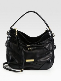 Buttery soft lambskin design in a slouchy shape with belted strap detail.Top handle, 7 dropDetachable, adjustable shoulder strap, 23-26 dropTop zip closureOne inside zip pocket and two inside open pocketsNylon lining15W X 11½H X 6DMade in Italy Buttery soft lambskin design in a slouchy shape with belted strap detail.Top handle, 7 dropDetachable, adjustable shoulder strap, 23-26 dropTop zip closureOne inside zip pocket and two inside open pocketsNylon lining15W X 11½H X 6DMade in Italy