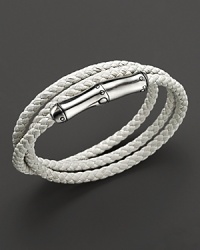 Snow-white leather is adorned with a bamboo sterling silver ornament, which cleverly hides a magnetic clasp. Snow-white leather is adorned with a bamboo sterling silver ornament, which cleverly hides a magnetic clasp.