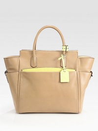 A dynamic pairing of nappa and glovetan leather in a roomy top handle carryall.Double top handles, 6½ dropFour outside open pocketsProtective metal feetOne inside zip pocketOne inside open pocketInner zip pouchSuede lining12W X 12¼H X 6DImported A dynamic pairing of nappa and glovetan leather in a roomy top handle carryall.Double top handles, 6½ dropFour outside open pocketsProtective metal feetOne inside zip pocketOne inside open pocketInner zip pouchSuede lining12W X 12¼H X 6DImported