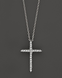 An elegant diamond cross in 18K. white gold. By Roberto Coin. An elegant diamond cross in 18K. white gold. By Roberto Coin.