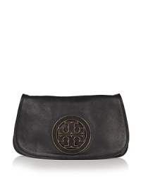 A eye-catching logo plaque adorns this pebbled leather clutch, featuring a removable chain strap for ultra-chic day-to-night style. By Tory Burch. A eye-catching logo plaque adorns this pebbled leather clutch, featuring a removable chain strap for ultra-chic day-to-night style. By Tory Burch.