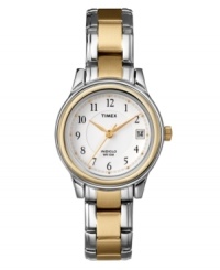 Contrasting metal tones and an elegant dial create this beautifully feminine watch by Timex. Two-tone stainless steel bracelet and round silver tone mixed metal case with gold tone bezel. White dial features black numerals and gold tone dot markers, subtle minute track, date window at three o'clock, gold tone hands, and logo. Quartz movement. Water resistant to 30 meters. One-year limited warranty. Contrasting metal tones and an elegant dial create this beautifully feminine watch by Timex. Two-tone stainless steel bracelet and round silver tone mixed metal case with gold tone bezel. White dial features black numerals and gold tone dot markers, subtle minute track, date window at three o'clock, gold tone hands, and logo. Quartz movement. Water resistant to 30 meters. One-year limited warranty.