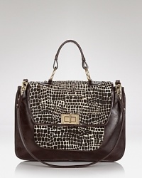 Rebecca Minkoff's tried-and-truly covet-worthy satchel with a twist. Carry this always-in-style bag for a day-right dose of the NYC label's downtown cool. Rebecca Minkoff's tried-and-truly covet-worthy satchel with a twist. Carry this always-in-style bag for a day-right dose of the NYC label's downtown cool.