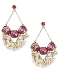 Clusters of glass pearls and fuchsia-colored crystal gems give these Betsey Johnson chandelier earrings extra charm. Crafted in antiqued gold tone mixed metal. Approximate drop: 3 inches. Clusters of glass pearls and fuchsia-colored crystal gems give these Betsey Johnson chandelier earrings extra charm. Crafted in antiqued gold tone mixed metal. Approximate drop: 3 inches.