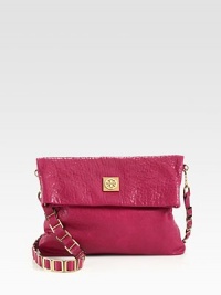 Luxurious textured leather with radiant hardware and a chic fold-over design, perfectly sized for all your essentials.Detachable leather and metal shoulder strap, 22 dropMagnetic top closureOne inside zip pocketTwo inside open pocketsCotton lining12W X 10H X 1¾DImported Luxurious textured leather with radiant hardware and a chic fold-over design, perfectly sized for all your essentials.Detachable leather and metal shoulder strap, 22 dropMagnetic top closureOne inside zip pocketTwo inside open pocketsCotton lining12W X 10H X 1¾DImported