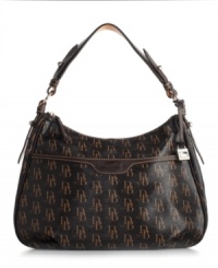 Dooney & Bourke's Collins shoulder bag goes with everything, in a chic 1975-themed signature print. Dooney & Bourke's Collins shoulder bag goes with everything, in a chic 1975-themed signature print.