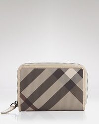 Burberry's check wallet is a classic reserve for your riches--slip the plaid package into your day bag for easy organization. Burberry's check wallet is a classic reserve for your riches--slip the plaid package into your day bag for easy organization.