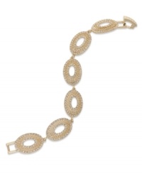 An elegant bracelet made for that special occasion. This Charter Club design sparkles with crystal accents on oval-links. Crafted in 14k gold-plated mixed metal. Approximate length: 7 inches. An elegant bracelet made for that special occasion. This Charter Club design sparkles with crystal accents on oval-links. Crafted in 14k gold-plated mixed metal. Approximate length: 7 inches.