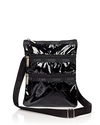 LeSportsac's Kasey crossbody bag in coated durable ripstop nylon is right on trend. Single adjustable crossbody strap. Two front exterior zip pockets. Top-zip closure. Lined. LeSportsac's Kasey crossbody bag in coated durable ripstop nylon is right on trend. Single adjustable crossbody strap. Two front exterior zip pockets. Top-zip closure. Lined.