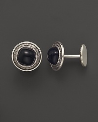 Elegant sterling silver cufflinks, set with agate, from Buccellati. Elegant sterling silver cufflinks, set with agate, from Buccellati.