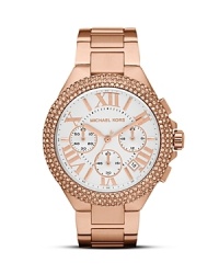 In the season's hottest color--rose gold--this Michael Kors watch is a sophisticated and stylish every day accessory. In the season's hottest color--rose gold--this Michael Kors watch is a sophisticated and stylish every day accessory.