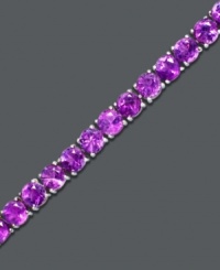 Deep violet decadence. Set in sterling silver, round-cut amethyst (7 ct. t.w.) makes quite a statement in this bracelet. Approximate length: 7 inches. Deep violet decadence. Set in sterling silver, round-cut amethyst (7 ct. t.w.) makes quite a statement in this bracelet. Approximate length: 7 inches.