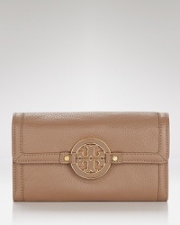 Cast in rich leather with a simple, streamlined shape, this practical piece from Tory Burch is an effortless choice for organizing the essentials. Cast in rich leather with a simple, streamlined shape, this practical piece from Tory Burch is an effortless choice for organizing the essentials.