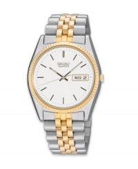 A timeless, handsome look from Seiko. Two-tone stainless steel bracelet and round case with textured gold tone bezel, 40mm. White dial features stick indices, minute track, day and date indicator in English or Spanish, luminous hands and logo. Quartz movement. Water resistant to 30 meters. Three-year limited warranty. A timeless, handsome look from Seiko. Two-tone stainless steel bracelet and round case with textured gold tone bezel, 40mm. White dial features stick indices, minute track, day and date indicator in English or Spanish, luminous hands and logo. Quartz movement. Water resistant to 30 meters. Three-year limited warranty.