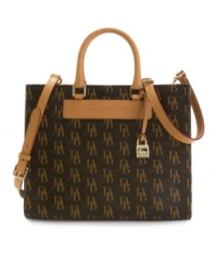 Dooney & Bourke's smart Janine satchel sports their heritage logo print in coated cotton, with smooth leather trim. Dooney & Bourke's smart Janine satchel sports their heritage logo print in coated cotton, with smooth leather trim.