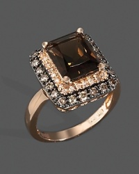 Diamonds and brown diamonds frame an emerald cut smoky topaz, set in 14K rose gold. Diamonds and brown diamonds frame an emerald cut smoky topaz, set in 14K rose gold.