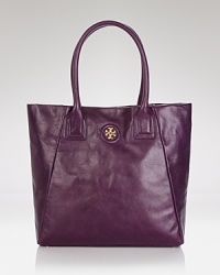Impossibly versatile, this Tory Burch tote encapsulates Manhattan cool, crafted of sophisticated vegan leather. Carry it uptown, downtown, and everywhere in between. Impossibly versatile, this Tory Burch tote encapsulates Manhattan cool, crafted of sophisticated vegan leather. Carry it uptown, downtown, and everywhere in between.