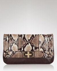 Inspired by retro style, Milly's python-embossed clutch is a classic take on this season's exotic bag trend. But if it has a vintage vibe, this bag's hardware and cool texture keep things wholly current. Inspired by retro style, Milly's python-embossed clutch is a classic take on this season's exotic bag trend. But if it has a vintage vibe, this bag's hardware and cool texture keep things wholly current.