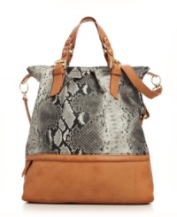 This spacious tote was made for the girl who doesn't travel light. A KDNY by Kelsi Dagger design featuring goldtone hardware, sleek contrast trim and convenient optional crossbody strap. This spacious tote was made for the girl who doesn't travel light. A KDNY by Kelsi Dagger design featuring goldtone hardware, sleek contrast trim and convenient optional crossbody strap.