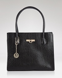 The textured trend proves right for daytime with this leather tote from DKNY. Designed for stylish versatility, it goes from corporate to casual without a slip in style. The textured trend proves right for daytime with this leather tote from DKNY. Designed for stylish versatility, it goes from corporate to casual without a slip in style.