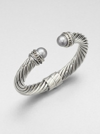 From the Pearl Crossover Collection. An iconic sterling silver cable accented with diamond and Tahitian pearl end caps. Cultured Tahitian pearlsDiamonds, .17 ctw Sterling silverDiameter, about 2.25Slip-on styleImported From the Pearl Crossover Collection. An iconic sterling silver cable accented with diamond and Tahitian pearl end caps. Cultured Tahitian pearlsDiamonds, .17 ctw Sterling silverDiameter, about 2.25Slip-on styleImported