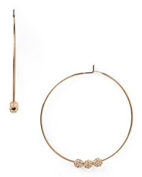 Disco drama comes calling with this pair of Michael Kors hoop earrings, which feature a trio of pave-adorned balls off set by gleaming plated metal. Disco drama comes calling with this pair of Michael Kors hoop earrings, which feature a trio of pave-adorned balls off set by gleaming plated metal.