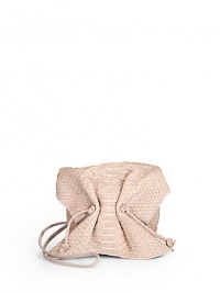 THE LOOKCrossbody strapCinched flapMagnetic tab closure under flapDrawstring topInside logo detailTHE MEASUREMENTCrossbody strap, 32 drop5W X 4H X 2½DTHE MATERIALPythonLeather and printed fabric liningORIGINMade in USA THE LOOKCrossbody strapCinched flapMagnetic tab closure under flapDrawstring topInside logo detailTHE MEASUREMENTCrossbody strap, 32 drop5W X 4H X 2½DTHE MATERIALPythonLeather and printed fabric liningORIGINMade in USA