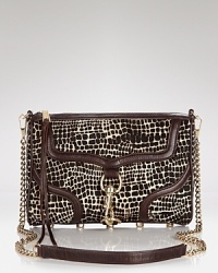 Designed with the wild child in mind, this crossbody bag from Rebecca Minkoff flashes serious skin in calf hair with leather trims. Designed with the wild child in mind, this crossbody bag from Rebecca Minkoff flashes serious skin in calf hair with leather trims.